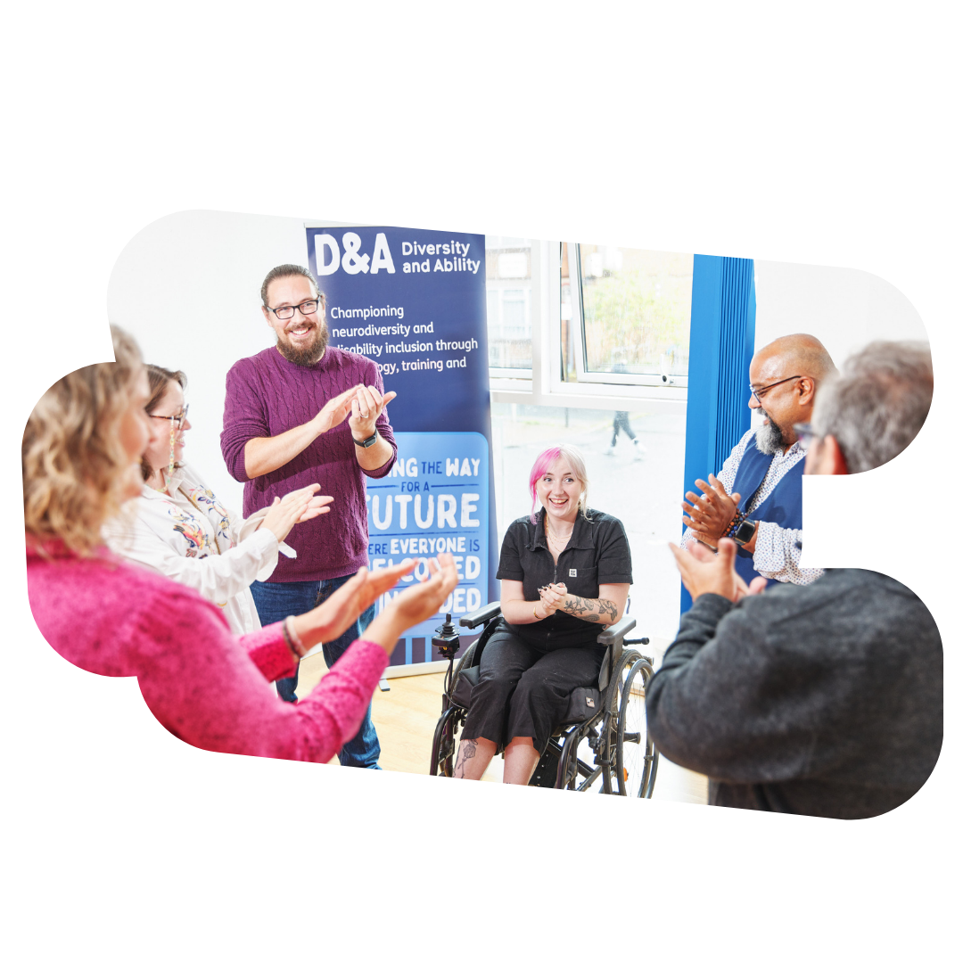 A group of people standing around a person in a wheelchair.